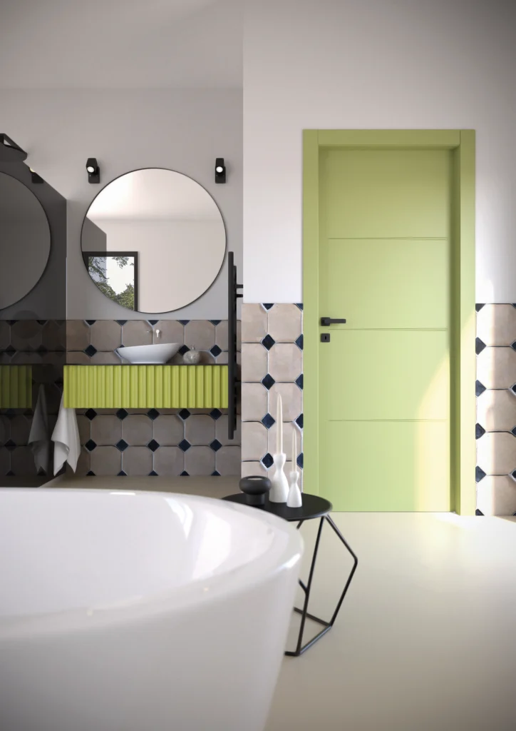 Porta della collezione Phantos, laccata di colore verde chiaro, incisa da righe orizzontali, ambientata in un bagno dallo stile materico ed eclettico.
