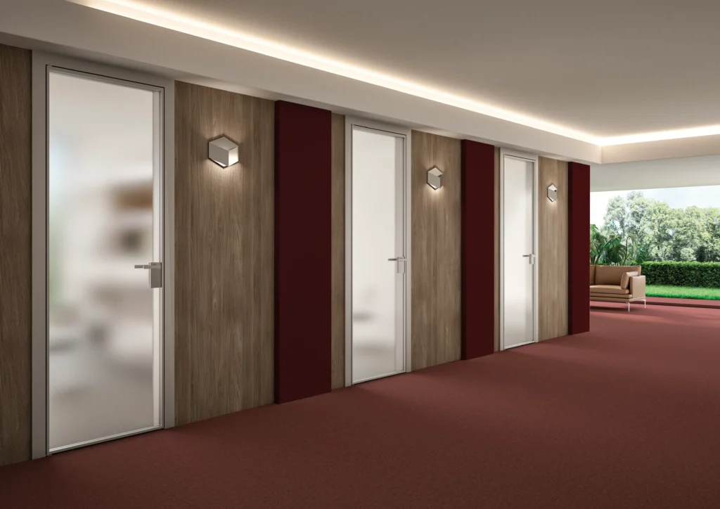Porta della collezione Flat, in vetro satinato inserite in un'azienda come ingresso dei diversi uffici