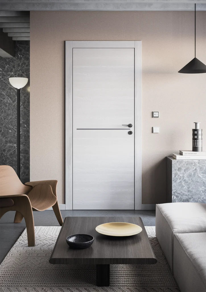 Porta collezione Zero con finitura Milk Bianco e inserto nero, ambientata in un ingresso dallo stile essenziale e moderno