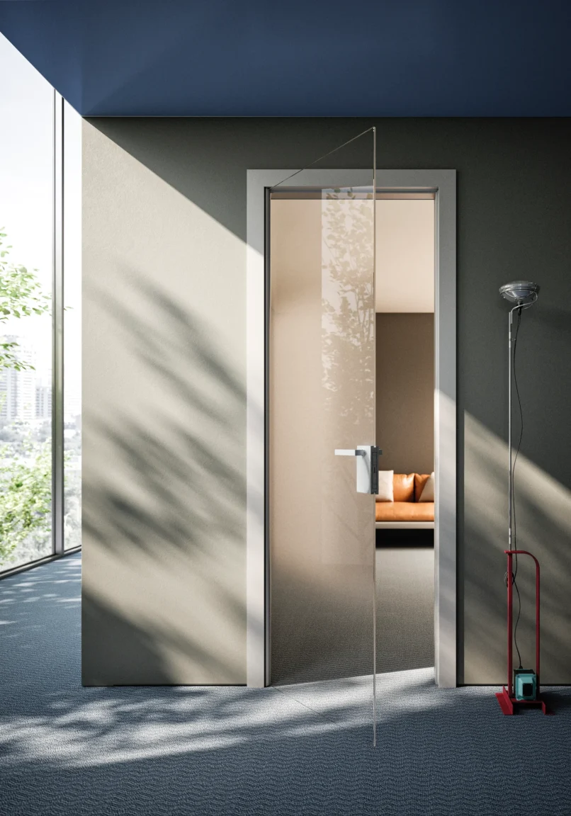 Porta della collezione Cristal in vetro Degradè con telaio laccato grigio, inserita all'interno di un'azienda